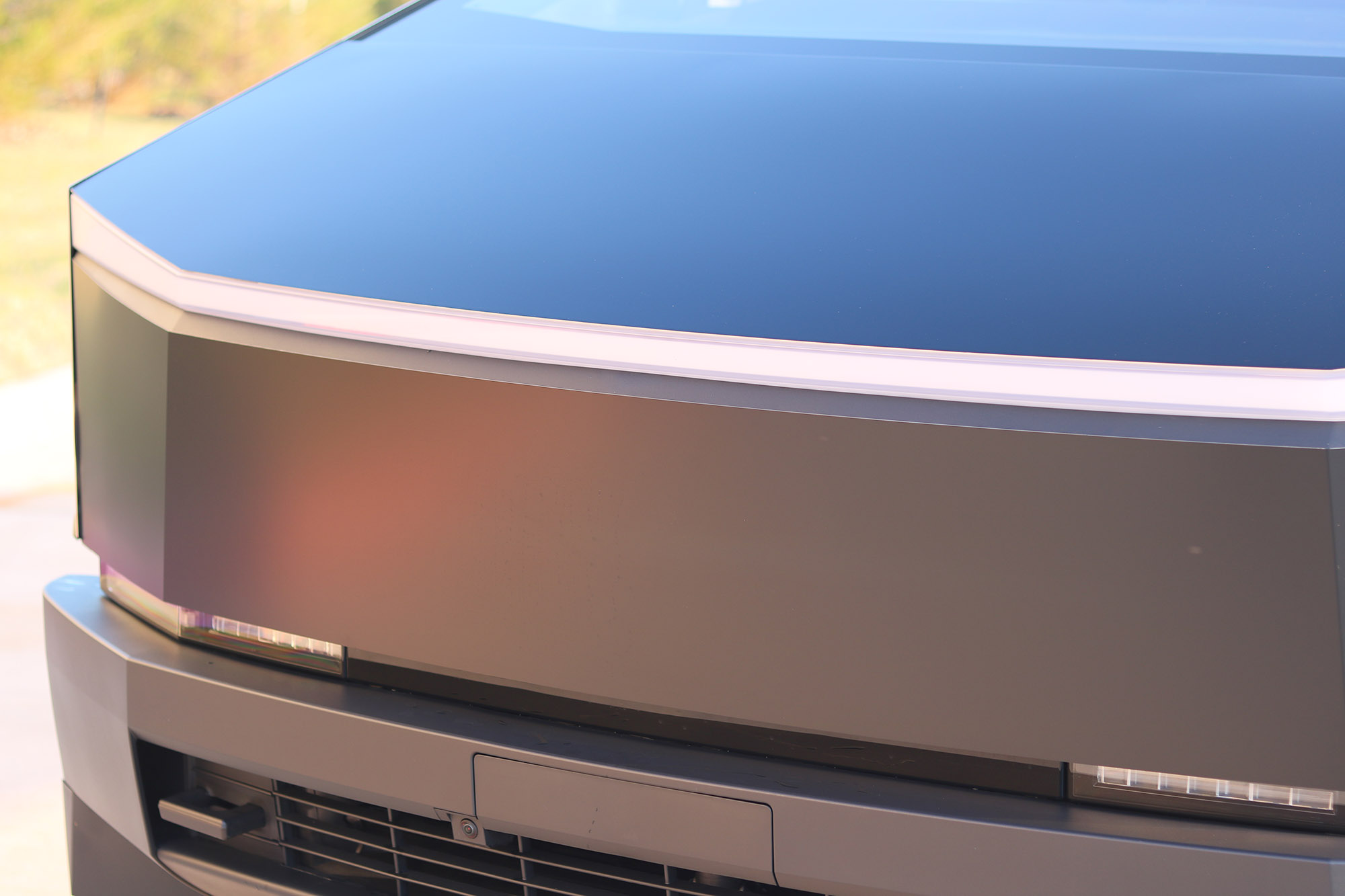Matte black Cybertruck front three quarter